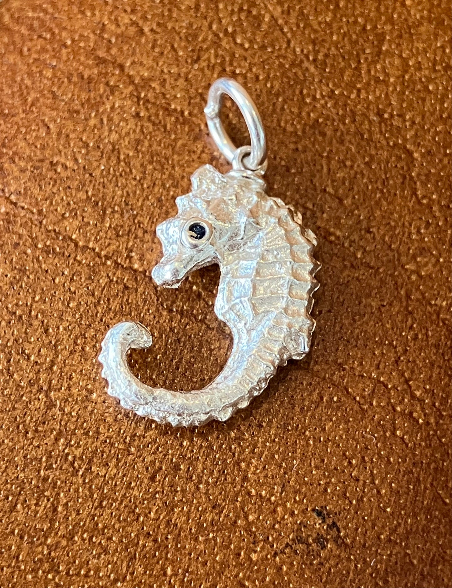 Small Silver Seahorse pendant with sapphire eyes