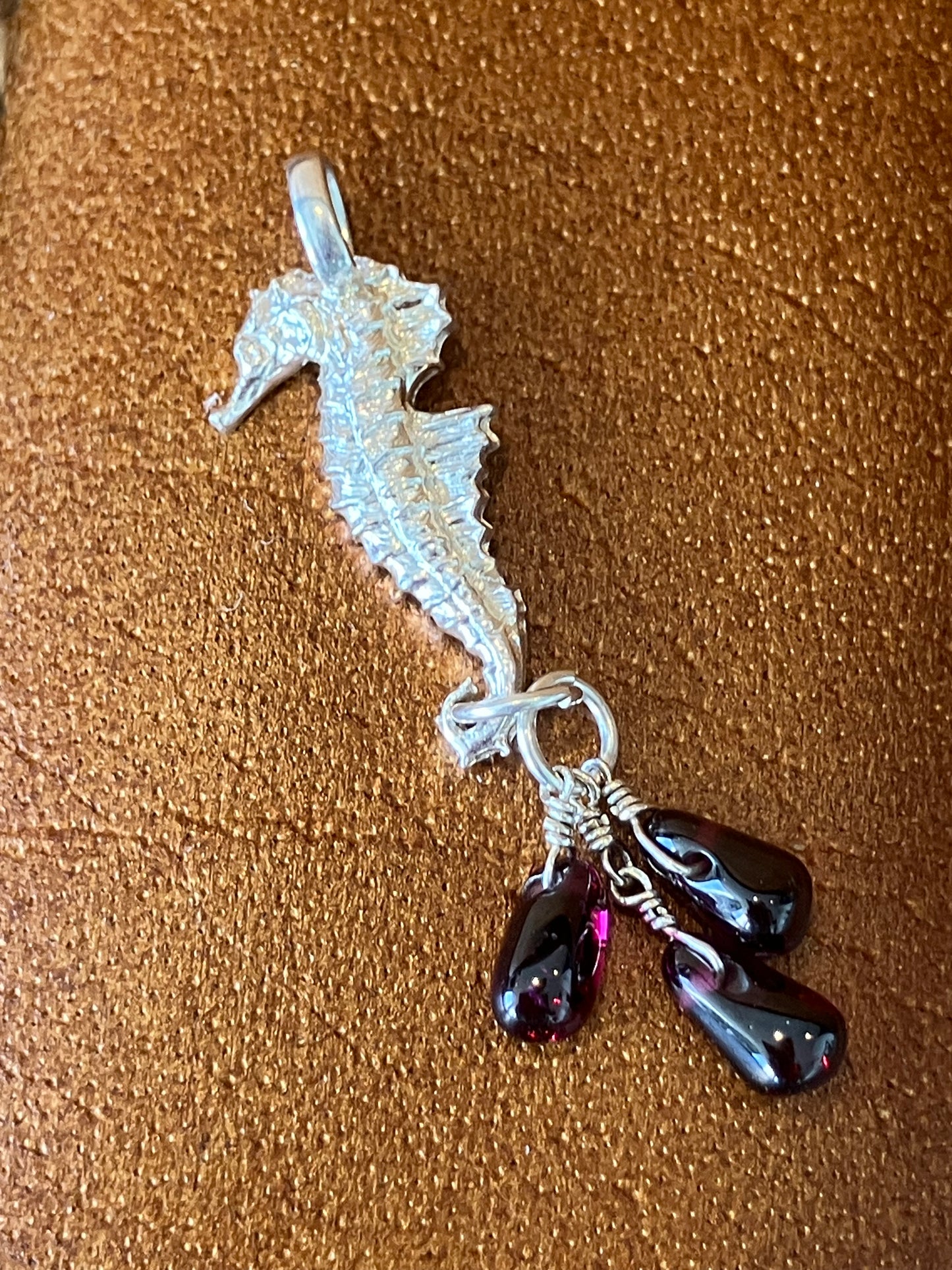 Silver Seahorse pendant with 3 garnet dangle