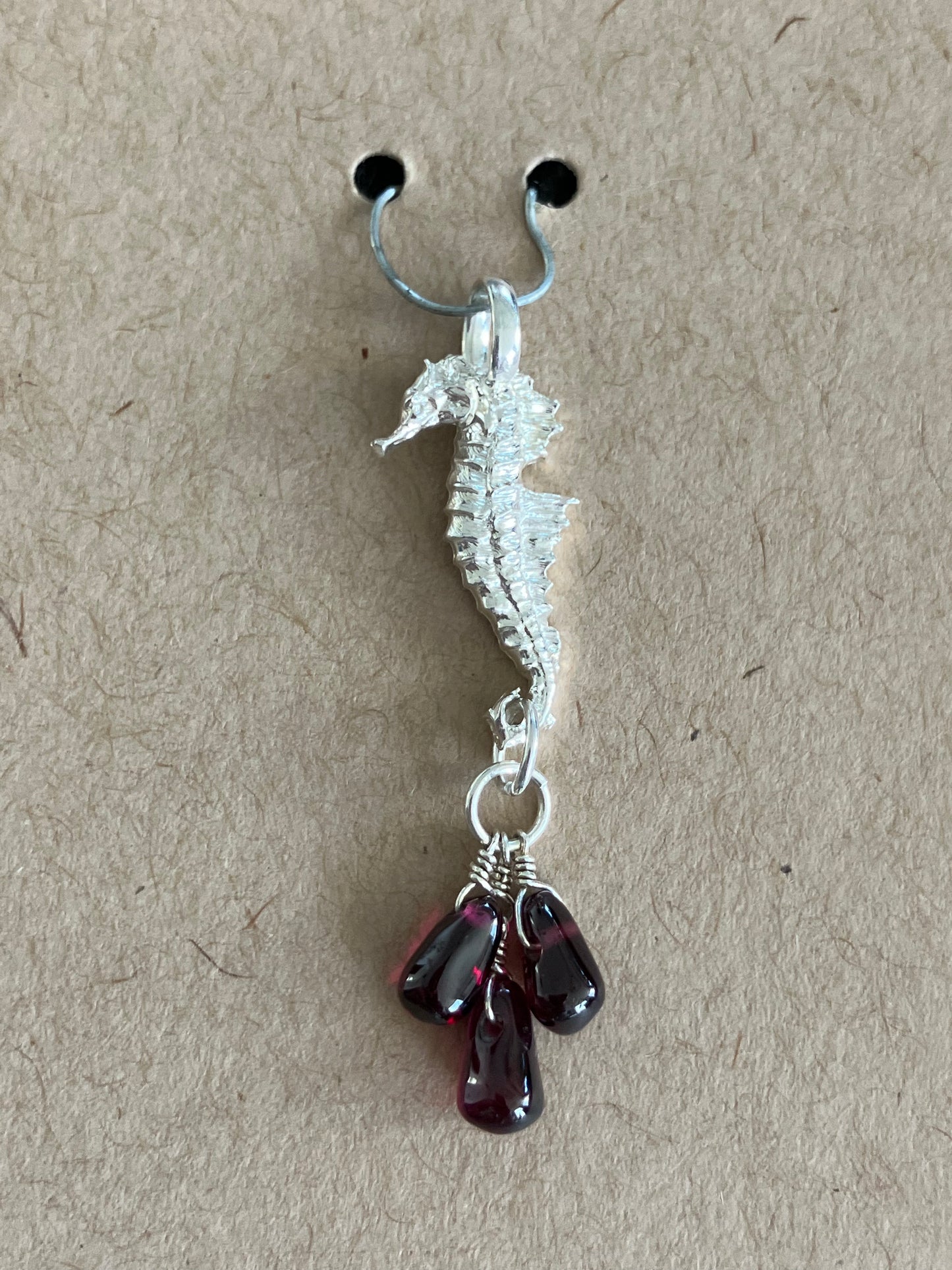 Silver Seahorse pendant with 3 garnet dangle