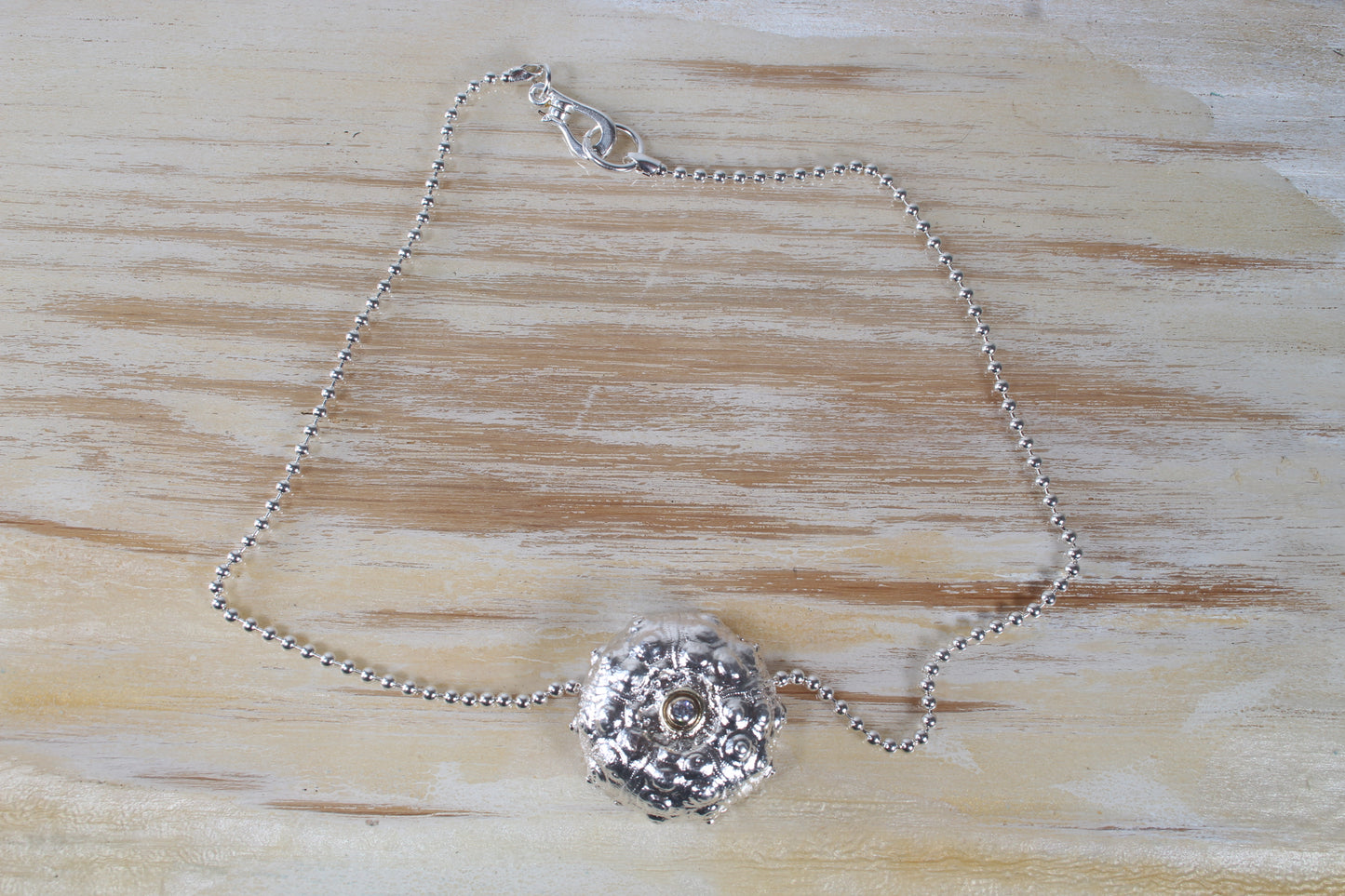 Large Silver Sputnik Urchin with gold set moissanite necklace