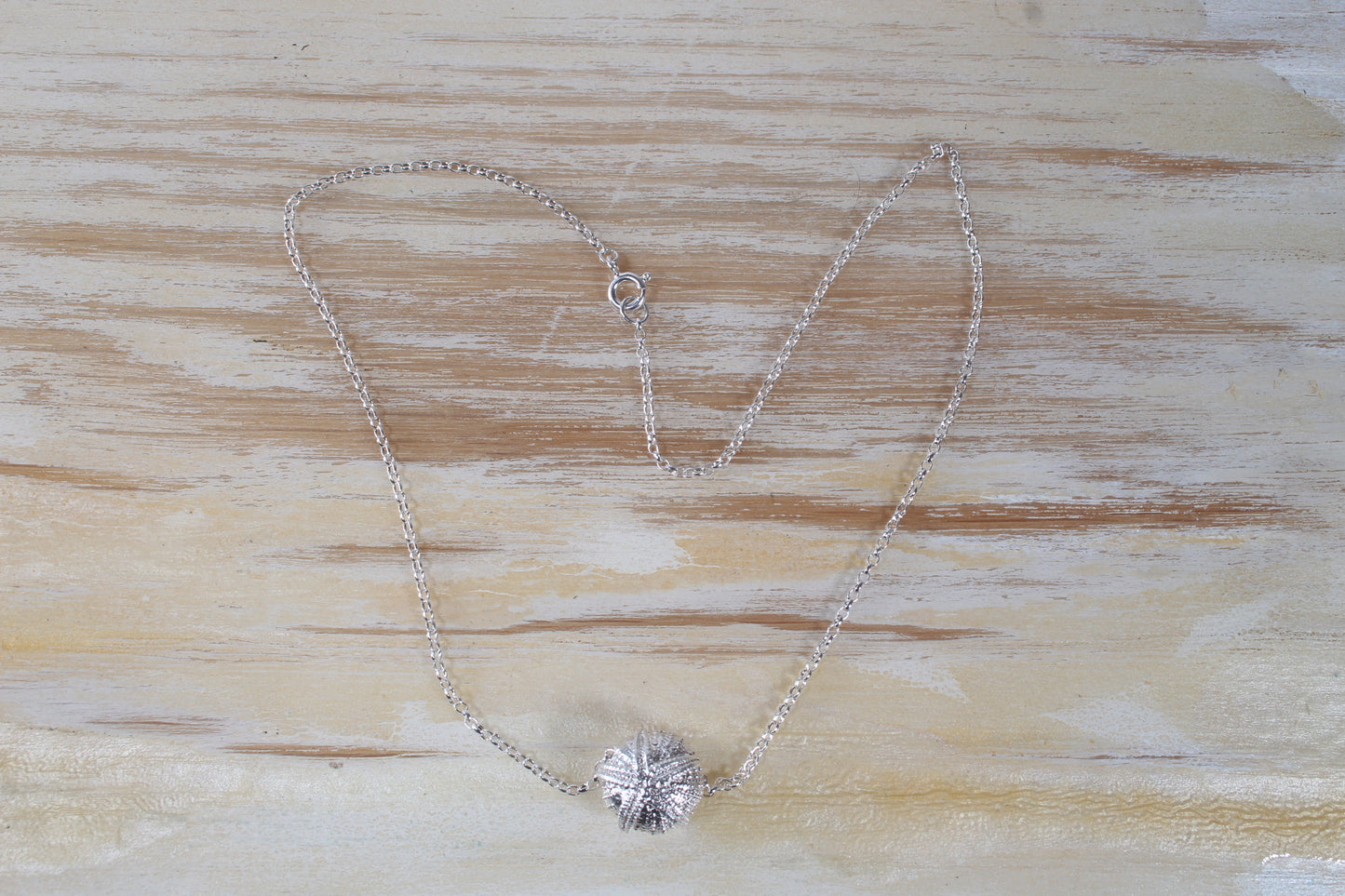 Silver Sea Urchin with Starfish on 18 inch chain necklace