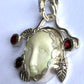 Face Pendant in Carved Bone With Silver & Red Garnet