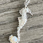 Silver Seahorse pendant with fixed pearl