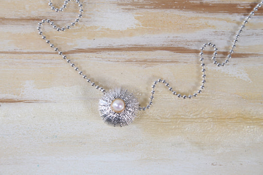 Silver Sea Urchin with gold set pearl necklace